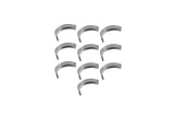 Set of ten silver metal engine main bearings for German auto engine repair.