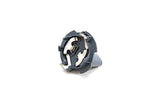 Grey plastic and metal automotive electrical connector component on a white background