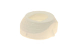 White plastic engine component part with circular opening and embossed text