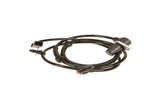 Black automotive sensor with wiring harness and connector for German car parts.