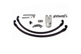 Automotive clutch kit with braided hoses, pressure plate, and mechanical components.