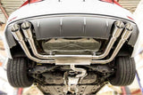 Stainless steel performance exhaust system with quad tips on a European car undercarriage