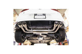 Dual stainless steel exhaust system installed on the underside of a white Volkswagen vehicle.