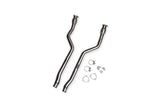 Stainless steel dual exhaust downpipes with mounting hardware for European vehicles.