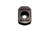 Black metal automotive part with CTS logo and central hole