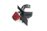 Red conical air filter with black intake tube and housing for VW Audi Porsche performance upgrade