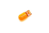 Amber colored automotive replacement bulb for turn signals or parking lights.