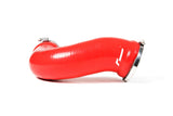 Red silicone turbo intake hose with metal clamps for German auto performance.