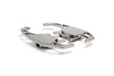 Pair of silver metallic automotive engine components on a white background.