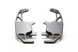 Pair of black metal battery terminals with positive and negative markings